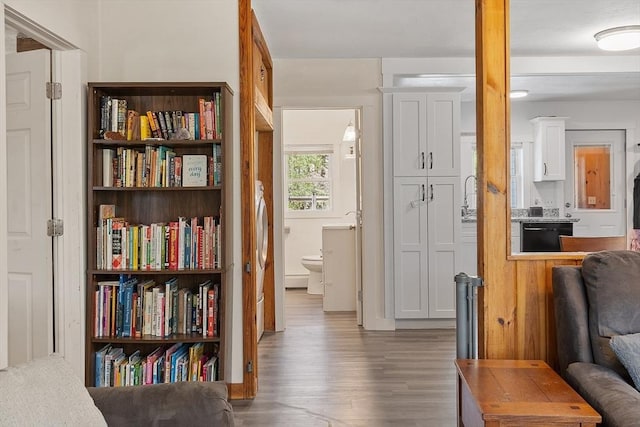 sitting room featuring wood finished floors