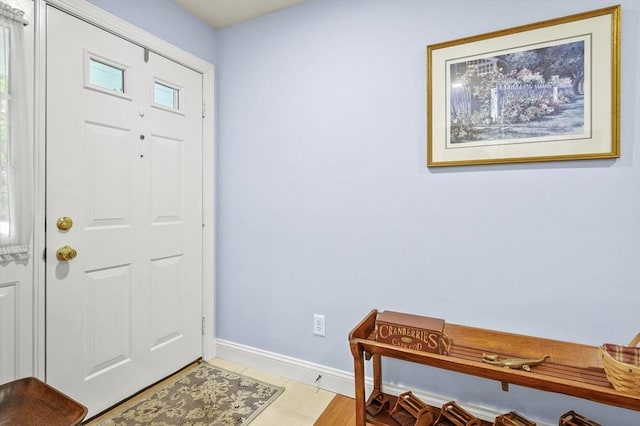 179 Hillside Village Dr Unit 179, West Boylston, MA 01583 - entrance foyer with baseboards and light tile patterned floors