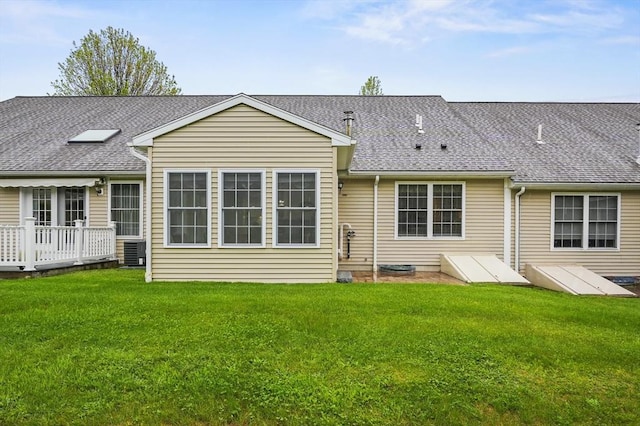 179 Hillside Village Dr Unit 179, West Boylston, MA 01583 - back of house with a lawn, roof with shingles, and a wooden deck