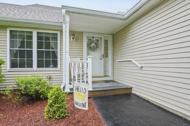 179 Hillside Village Dr Unit 179, West Boylston, MA 01583 - property entrance with a shingled roof