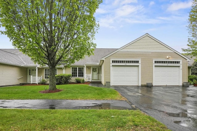 179 Hillside Village Dr Unit 179, West Boylston, MA 01583 - view of front of home with an attached garage, asphalt driveway, and a front yard
