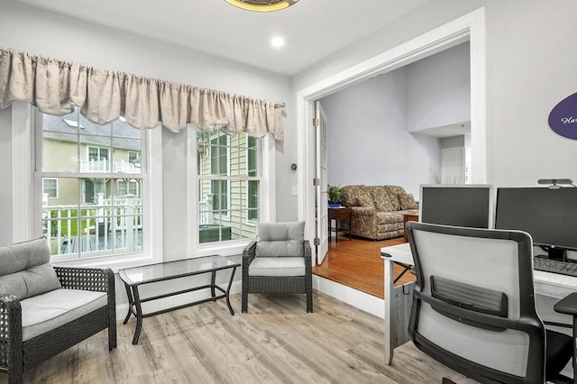 179 Hillside Village Dr Unit 179, West Boylston, MA 01583 - living area featuring light wood-style floors and healthy amount of natural light