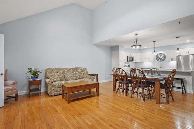 179 Hillside Village Dr Unit 179, West Boylston, MA 01583 - dining area featuring light wood-style floors, baseboards, and recessed lighting