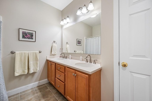 17 Cortland Grove Dr Unit 17, Shrewsbury, MA 01545 - bathroom with double vanity and tile patterned flooring