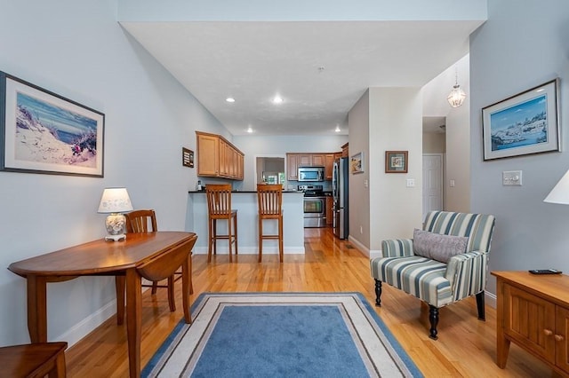 17 Cortland Grove Dr Unit 17, Shrewsbury, MA 01545 - living area featuring light wood finished floors and recessed lighting
