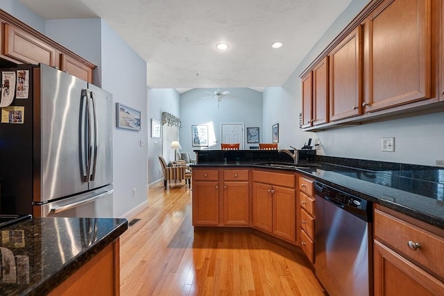 17 Cortland Grove Dr Unit 17, Shrewsbury, MA 01545 - kitchen featuring stainless steel appliances, a peninsula, light wood finished floors, brown cabinets, and recessed lighting