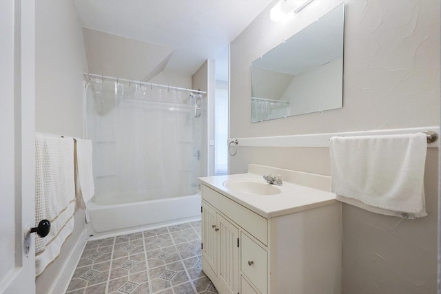 bathroom featuring vanity and shower / bath combo with shower curtain