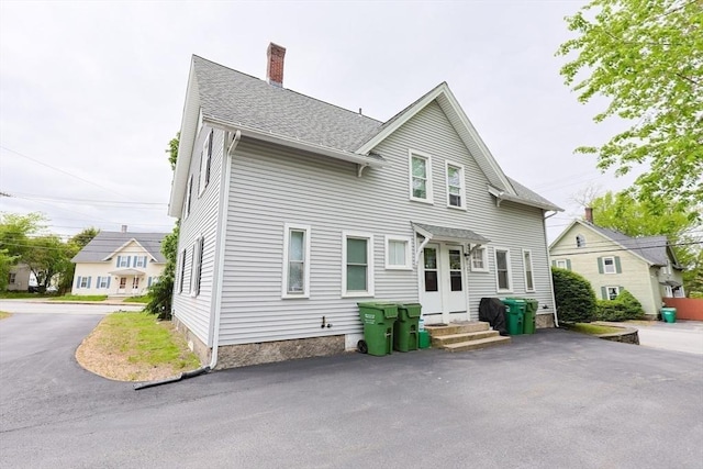 258-260 Main St, Northbridge, MA 01588 - view of front of property with a chimney and a shingled roof
