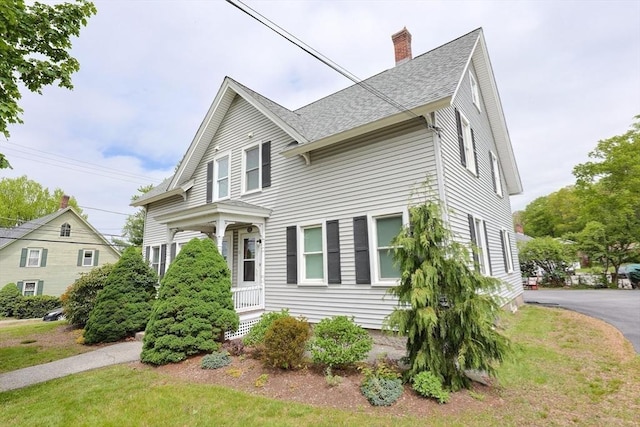 258-260 Main St, Northbridge, MA 01588 - view of front of house with a chimney and a shingled roof