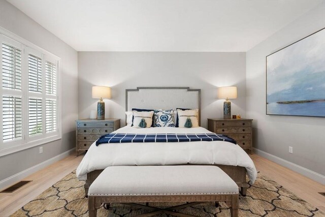 7 Bethpage Ln, Plymouth, MA 02360 - bedroom featuring light wood-type flooring, baseboards, and visible vents