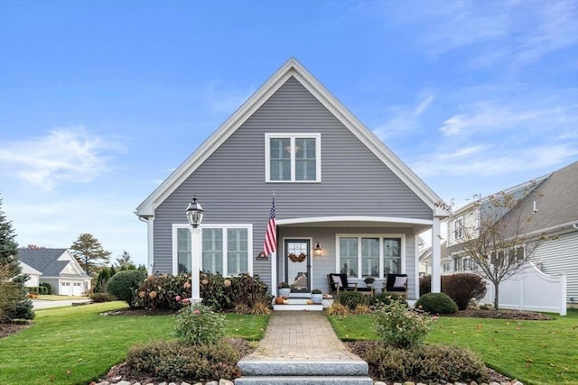 7 Bethpage Ln, Plymouth, MA 02360 - bungalow-style home featuring a porch and a front yard