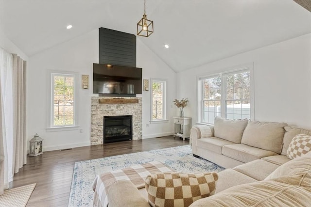 4 Barrows Brook Cir, Kingston, MA 02364 - living area with plenty of natural light, wood finished floors, high vaulted ceiling, baseboards, and recessed lighting