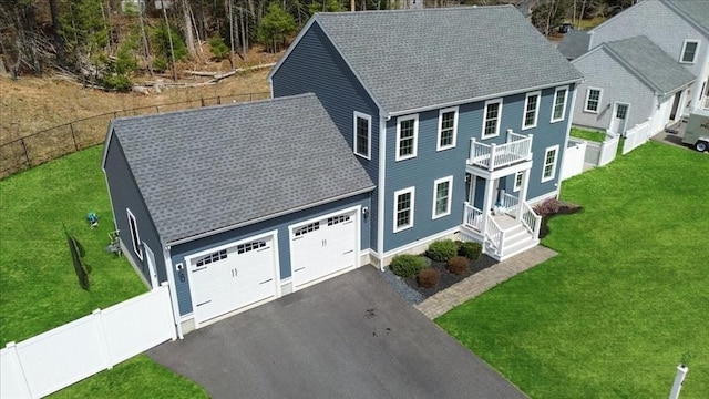 4 Barrows Brook Cir, Kingston, MA 02364 - view of front of property with a balcony, a shingled roof, driveway, and an attached garage