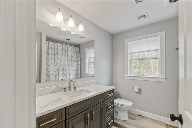 4 Barrows Brook Cir, Kingston, MA 02364 - full bath with healthy amount of natural light, baseboards, toilet, and vanity