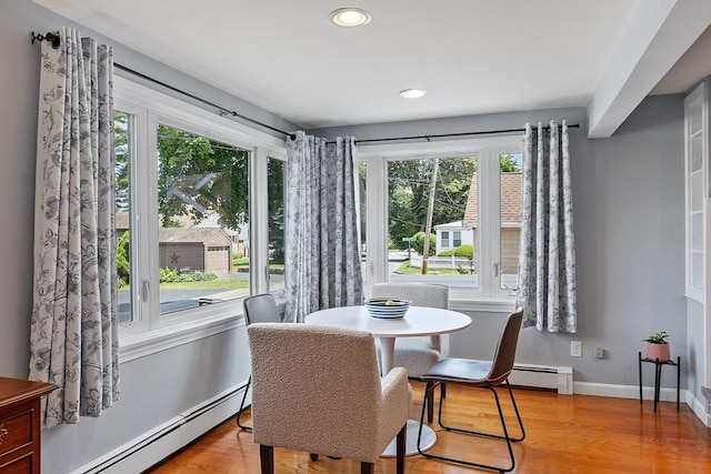 9 Crescent Ave, Lynnfield, MA 01940 - dining space with baseboard heating, wood finished floors, and recessed lighting