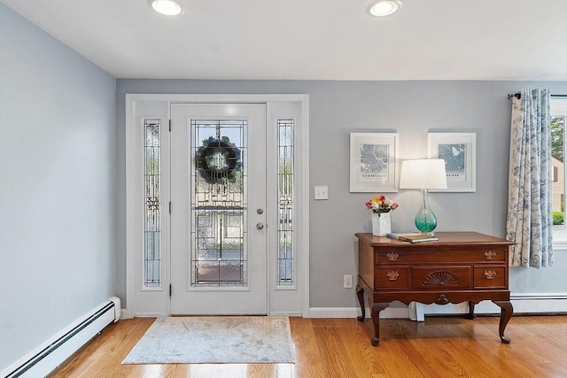 9 Crescent Ave, Lynnfield, MA 01940 - foyer with baseboard heating, wood finished floors, and recessed lighting