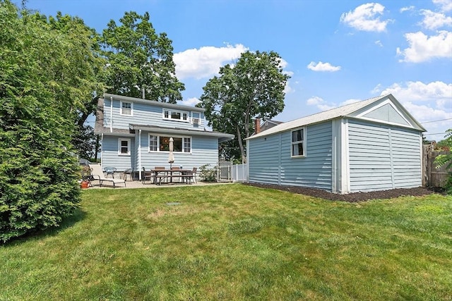 9 Crescent Ave, Lynnfield, MA 01940 - back of property featuring a patio area and an outbuilding