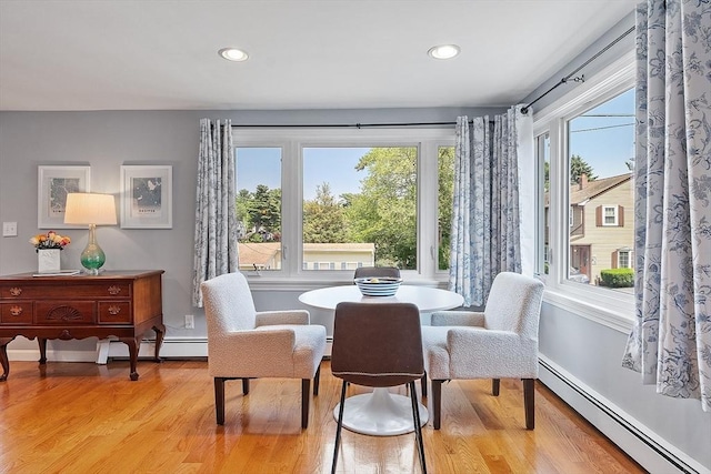 9 Crescent Ave, Lynnfield, MA 01940 - dining space featuring baseboard heating, light wood-type flooring, and recessed lighting