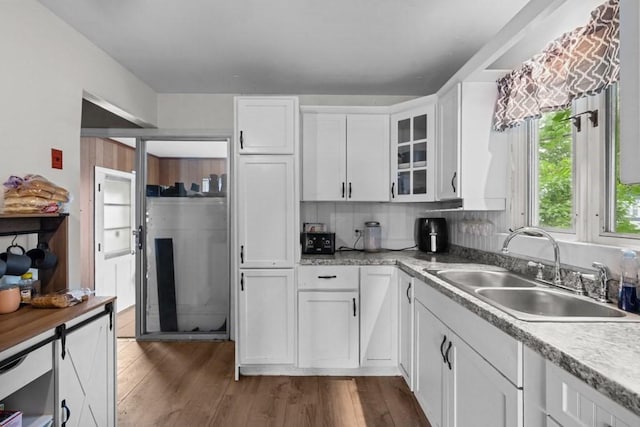 34 Coolidge St, Dartmouth, MA 02748 - kitchen with white cabinetry, dark wood-type flooring, and glass insert cabinets