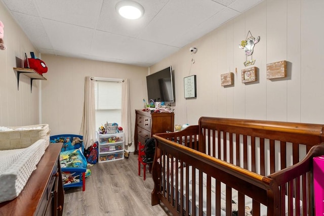 bedroom featuring wood finished floors