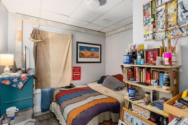 bedroom featuring a drop ceiling