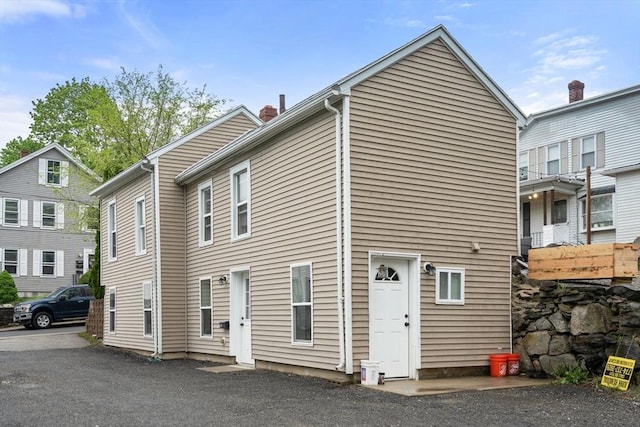 exterior space featuring a chimney