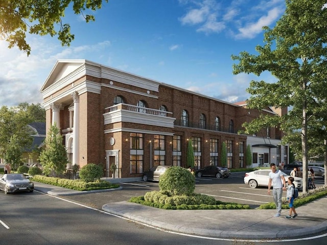 61 Hall St Unit 3, Waltham, MA 02453 - view of building exterior featuring uncovered parking