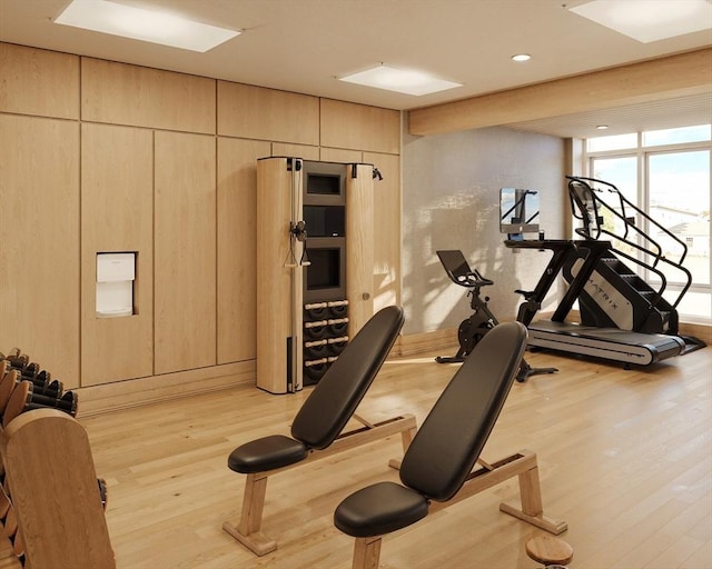 61 Hall St Unit 3, Waltham, MA 02453 - exercise room featuring light wood-type flooring and recessed lighting
