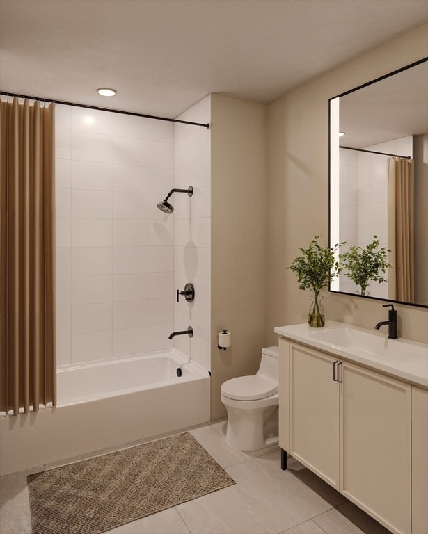 full bathroom with vanity, toilet, tile patterned floors, and shower / bath combo