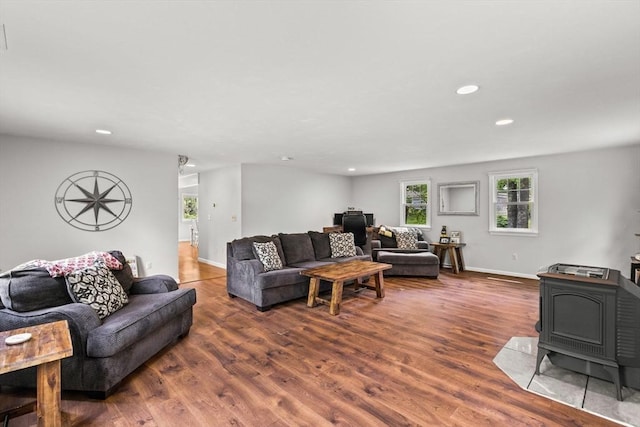 31 Fearing Hill Rd, Wareham, MA 02571 - living room featuring a wood stove, wood finished floors, recessed lighting, and baseboards