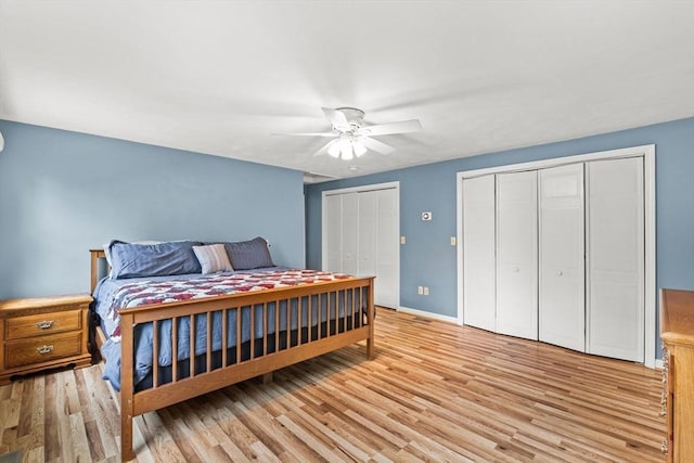 31 Fearing Hill Rd, Wareham, MA 02571 - bedroom featuring multiple closets, wood finished floors, baseboards, and a ceiling fan