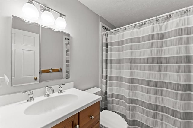 31 Fearing Hill Rd, Wareham, MA 02571 - bathroom featuring vanity, toilet, a textured ceiling, and a shower with curtain