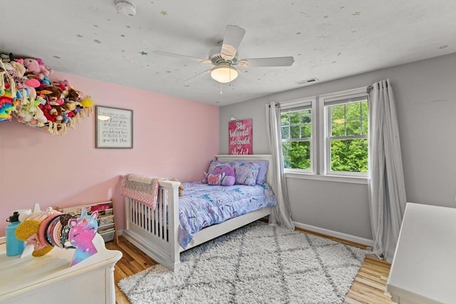 31 Fearing Hill Rd, Wareham, MA 02571 - bedroom with wood finished floors, a ceiling fan, and baseboards