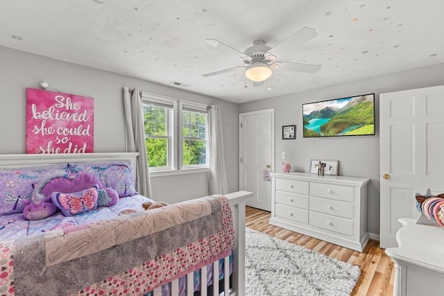 31 Fearing Hill Rd, Wareham, MA 02571 - bedroom with light wood-type flooring, a ceiling fan, and baseboards
