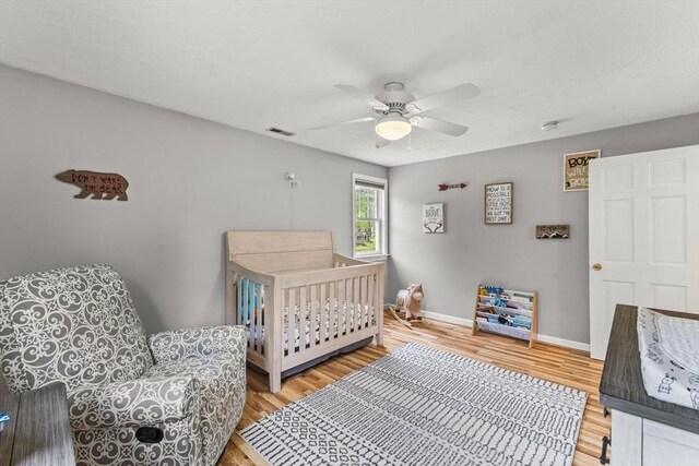 31 Fearing Hill Rd, Wareham, MA 02571 - bedroom with baseboards, light wood-type flooring, and ceiling fan