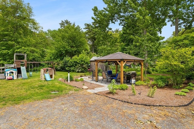 31 Fearing Hill Rd, Wareham, MA 02571 - view of green lawn featuring a playground, a gazebo, and a patio area
