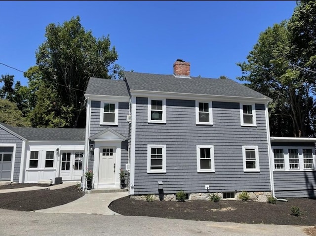 colonial home featuring a garage