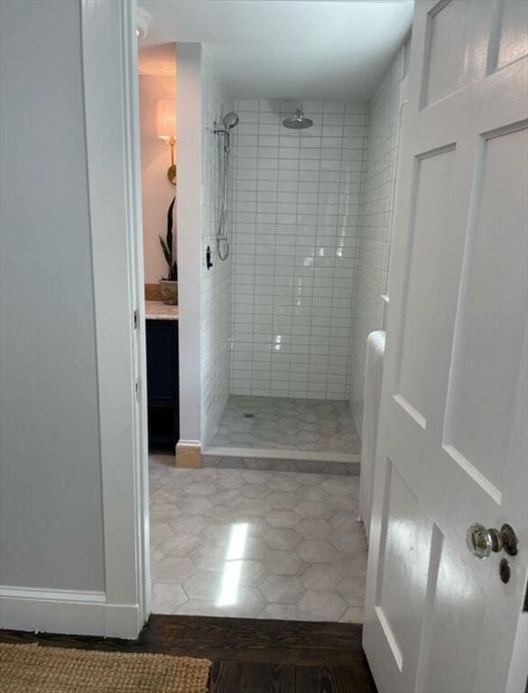 bathroom with tiled shower