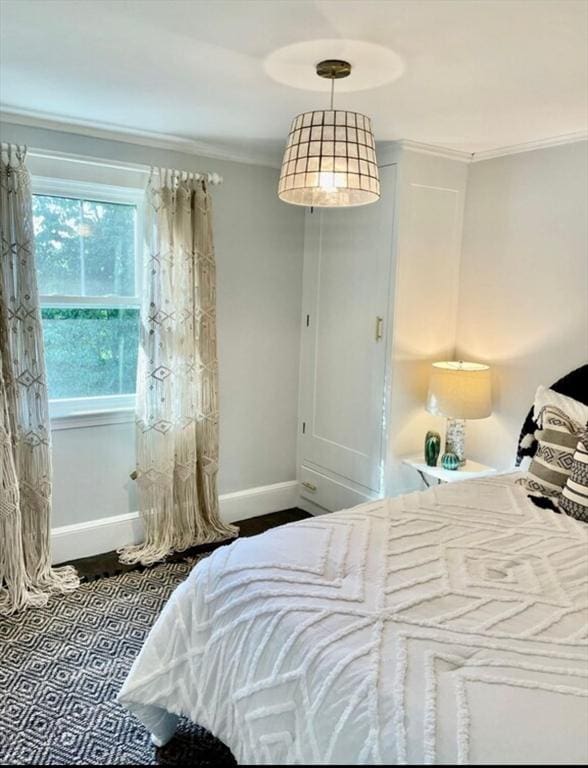 bedroom with ornamental molding