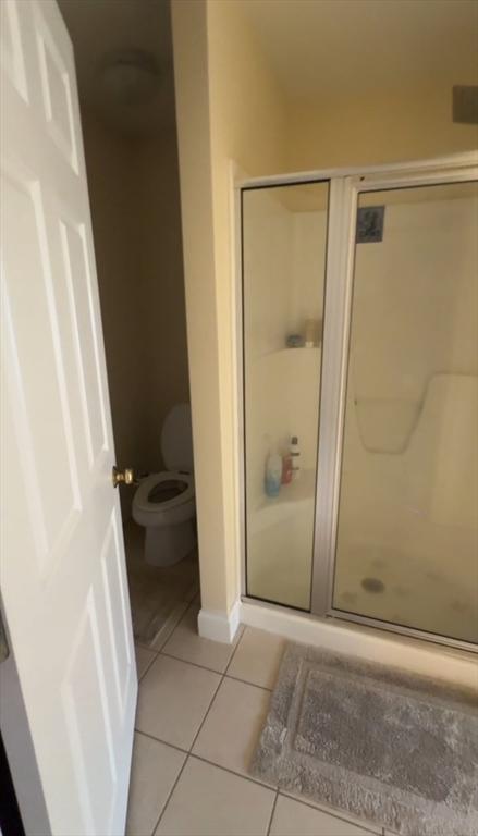 5 Lincoln Ln Unit 5, Grafton, MA 01536 - full bath featuring tile patterned floors, a stall shower, toilet, and baseboards