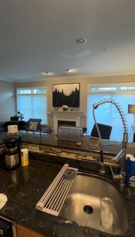 5 Lincoln Ln Unit 5, Grafton, MA 01536 - kitchen featuring a fireplace and dark stone countertops