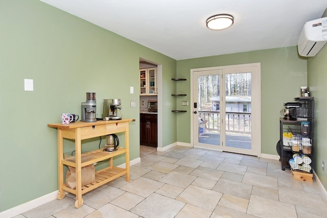 doorway to outside with light tile patterned floors and a wall unit AC