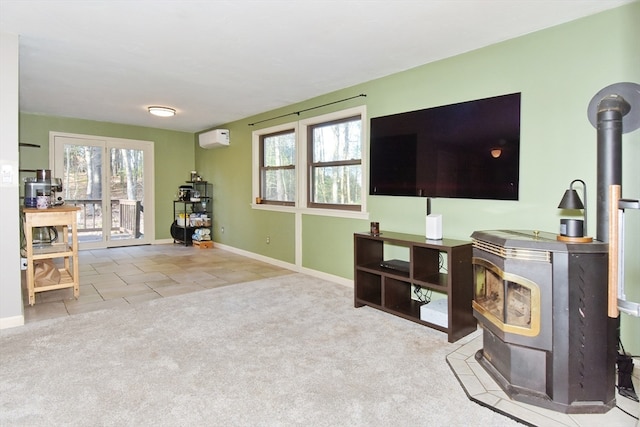 living room featuring a wall mounted air conditioner, light colored carpet, a wood stove, and a healthy amount of sunlight