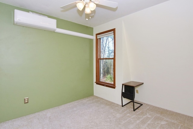 carpeted empty room with ceiling fan and a wall mounted air conditioner