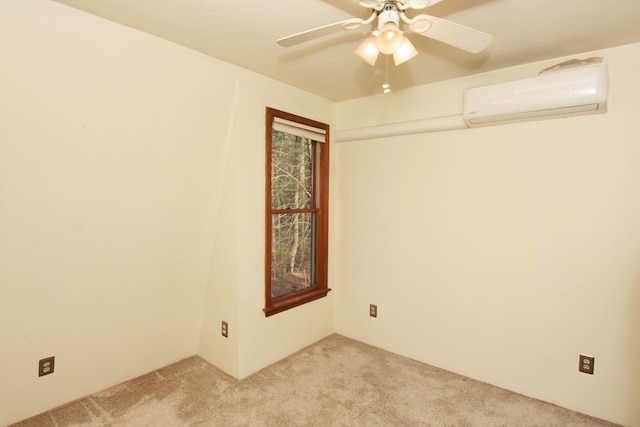 spare room featuring ceiling fan, an AC wall unit, and light carpet