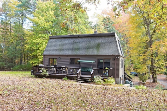 view of front of home with a wooden deck