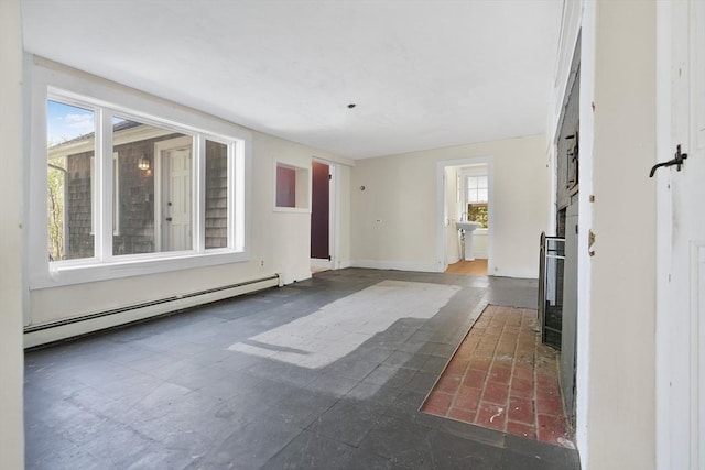 interior space with baseboards and baseboard heating