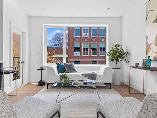 27 Dixwell Unit 11, Boston, MA 02119 - living area featuring wood finished floors and baseboards
