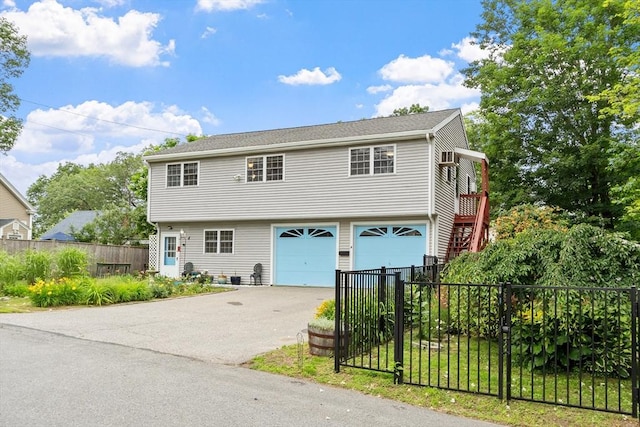 4 Fiske Ave, Chelmsford, MA 01863 - view of front of house with driveway and an attached garage