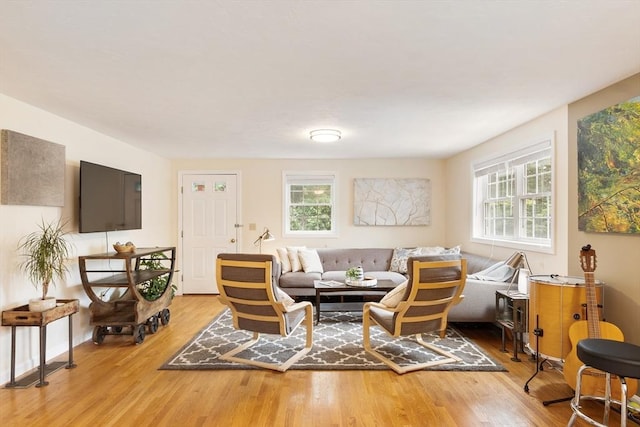 4 Fiske Ave, Chelmsford, MA 01863 - living area with healthy amount of natural light and wood finished floors